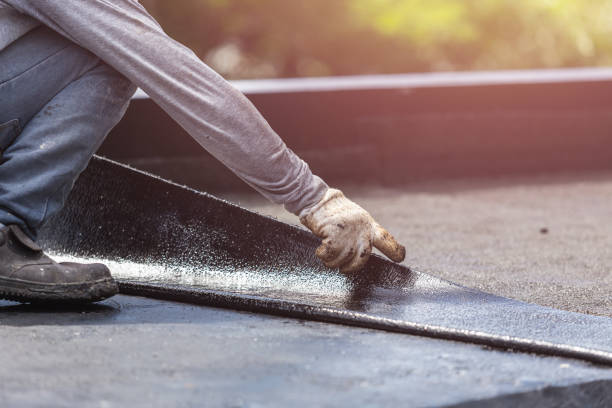 Professional Basement Waterproofing technician working in Kechi, KS